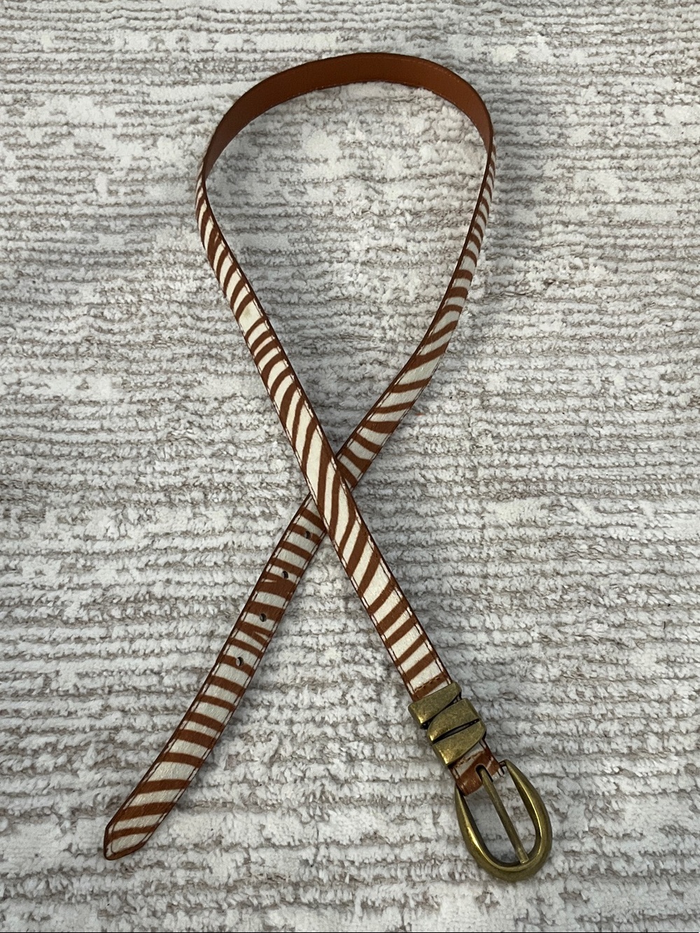 Brown and White Striped belt with brass color buckle